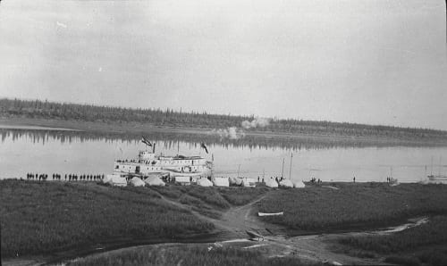 old picture of ship in the lake